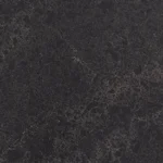 Caesarstone 5820 Darcrest surface with Dark textured surface with subtle gray and black marbling patterns.