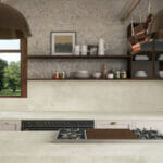 Farmhouse One-wall kitchen with island in Caesarstone 413 White Ciment