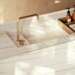 Everline porcelain bathroom countertop with a white base and fine gray veins reminiscent of ancient stone