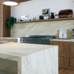 Mirabel porcelain countertop and kitchen island with an ivory base with charcoal and gray veining