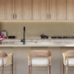 Caesarstone ICON 4401 Organic Dusk dark beige surface featured in a modern one-wall kitchen with island